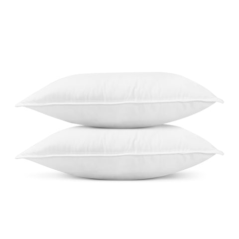 Two Pillowtex hypoallergenic white polyester pillows on a white background.