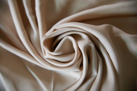 A close up of a Pillowtex Copper Infused Bamboo Sheet Set | Antimicrobial, Cooling, and Breathable fabric.