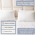 Image of a bed with white pillows and bedding against a beige upholstered headboard. Text labels beside the hypoallergenic Downlite Spira® Cluster Down Alternative Pillows highlight features: "Machine Washable," "100% Polyester," and "Cotton Cover." Available sizes include Standard (20 in x 26 in), Queen (20 in x 30 in), and King (20 in x 36 in).