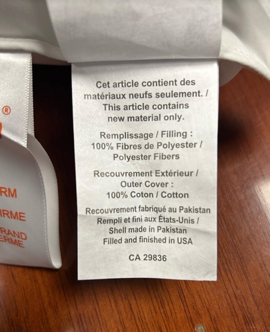 A label with supportive information on the Holiday Inn® Firm Support Polyester Pillow Combo Pack (Includes 2 Pillows) by Hollander.