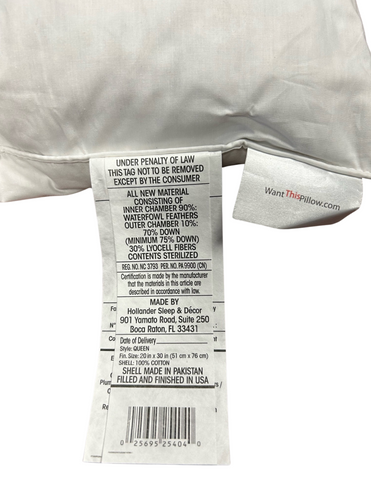A close-up view of a luxury pillow's care label, revealing material composition, washing instructions, and manufacturing details for the Pacific Coast Feather Company Marriott<sup>®</sup> Down and Feather Pillow, with a partially visible trademark suggestion to 'wantthis'.