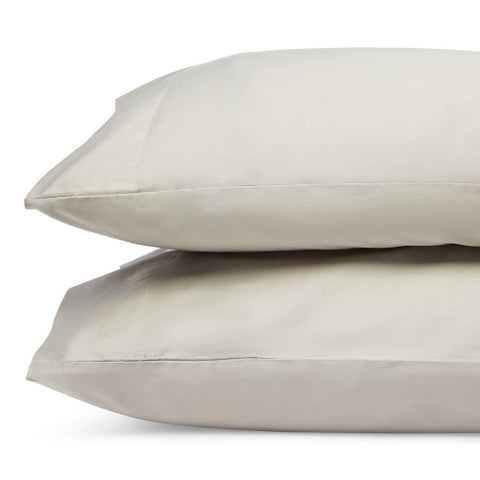 A pair of Delilah Home Organic Cotton Pillowcases on a white background.