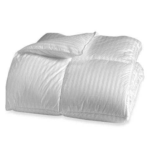 A white comforter made with Final Sale: Natural Living Ingeo Comforter | Environmentally Friendly Natural Fibers on a white background.