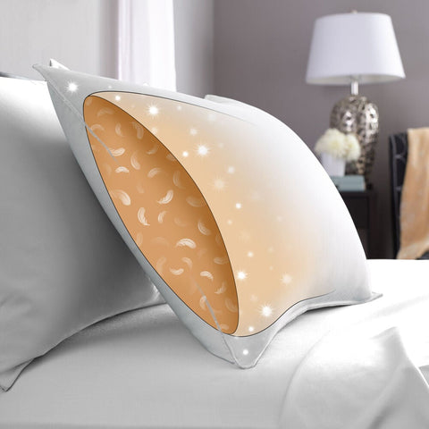 A Pacific Coast Feather Company® feather pillow on a bed with a moon on it provides support during sleep.