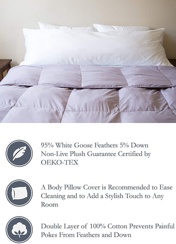 A bed with a Pillowtex White Goose Feather and Down Body Pillow and a soft pillow.