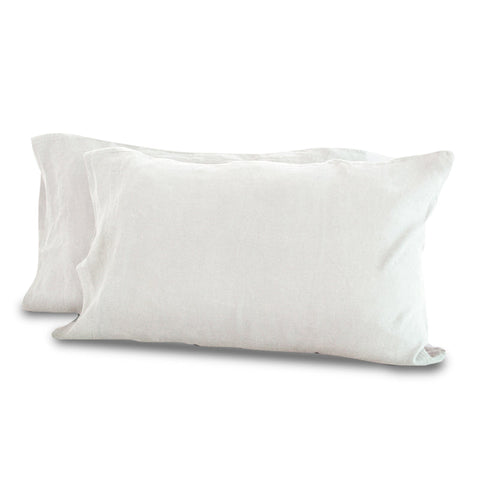 Two plain white rectangular pillows with a linen-like texture, isolated on a white background, suggesting a clean and simple bedroom aesthetic with luxury Delilah Home Hemp Pillowcase Set.