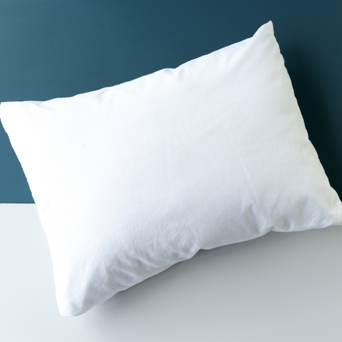This Perfect Choice™ Gold Pillow by Carpenter Co. | Made in USA is on a blue background.