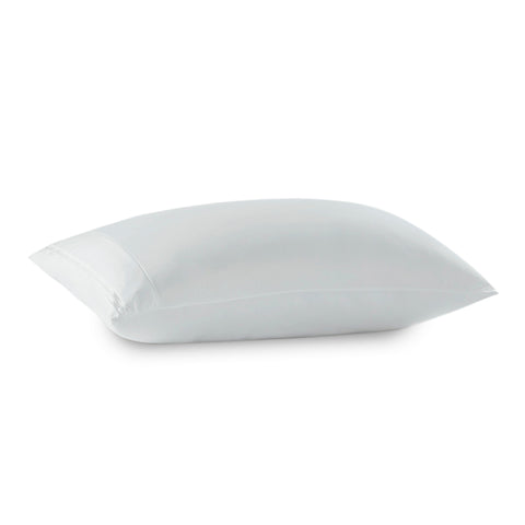 A single, soft white pillow isolated on a pure white background, the image showcasing the pillow's plumpness and smooth fabric with a PureCare OmniGuard® Pillow Protector, suggesting comfort and simplicity in design.
