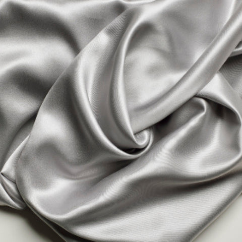 A close up image of a PureCare Pure Silk Pillowcase, perfect for skin care.