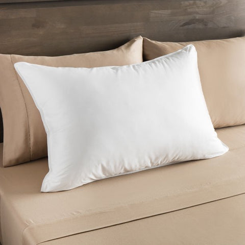 A white Best Western® Everest Pillow from Keeco on top of a bed with hypoallergenic fabric.