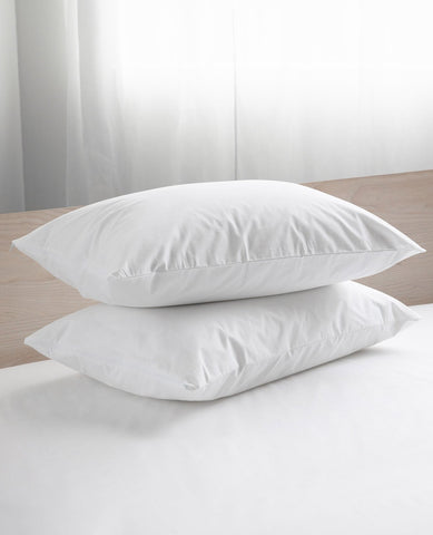 Two JS Fiber "Ultra Down" Polyester Pillows | Firm on top of a comfortable bed.