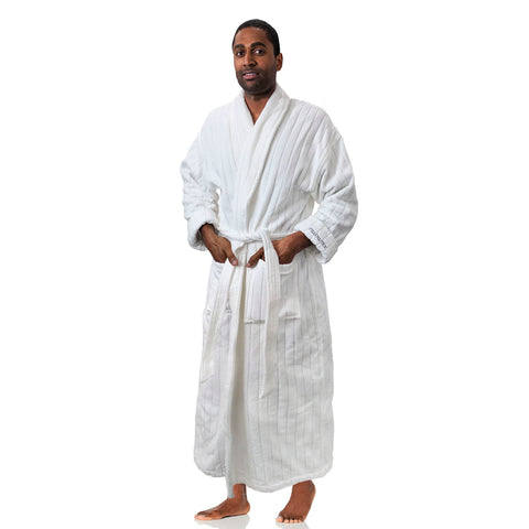 A man in a white Pillowtex Hotel Robe standing on a white background.