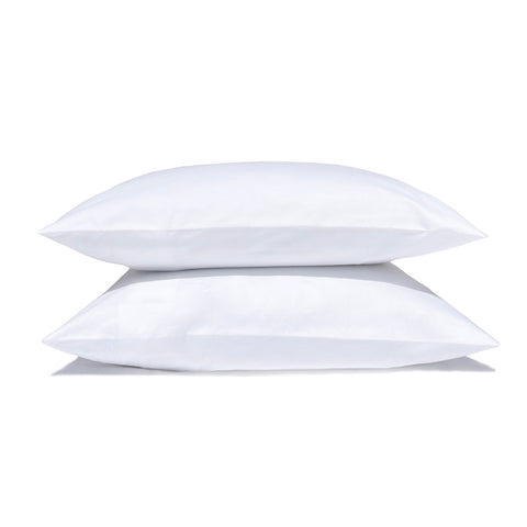 Two white Pillowtex hotel pillows on a white background.