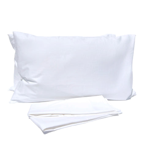 A white Pillowtex pillowcase and a white sheet made of a Cotton Polyester blend fabric on a white surface.