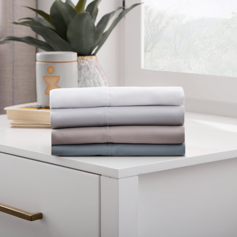 Malouf Brushed Microfiber Pillowcase Set in off-white, Ash, Pacific, and Drift Wood 