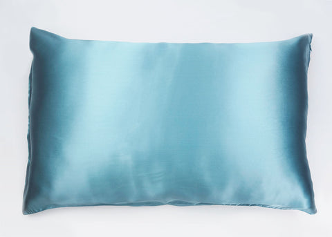 A 100% Mulberry Silk Pillowcase in blue, on a white background.