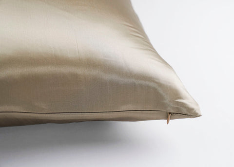 A Pillowtex 100% Mulberry Silk Pillowcase on a white surface.