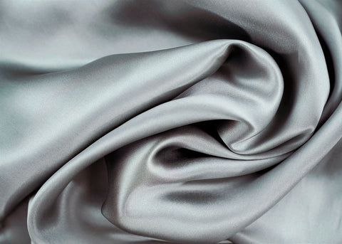 A close-up image of a Pillowtex 100% Mulberry Silk Pillowcase, perfect for skin care and hair care.