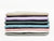 silk pillowcases stacked showing color options fawn, lavender, slate, blue, dustry rose, white, and gray
