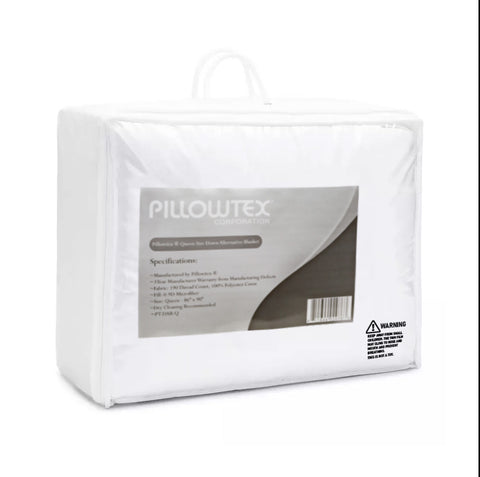 Packaged Hotel Quality Pillowtex® Total Bedding Package comforter in a transparent plastic case with specifications, highlighting queen size dimensions, hypoallergenic materials, and a warning label.