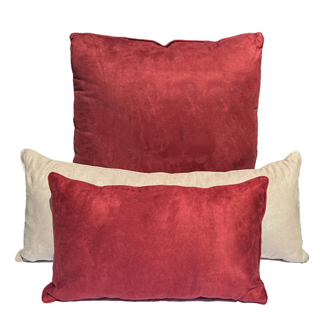 Three Pillowtex Faux Suede Decorative Throw Pillows in red velvet on a white background.