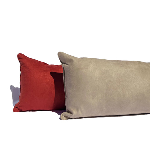 Two high quality Pillowtex Faux Suede decorative throw pillows on a white background.