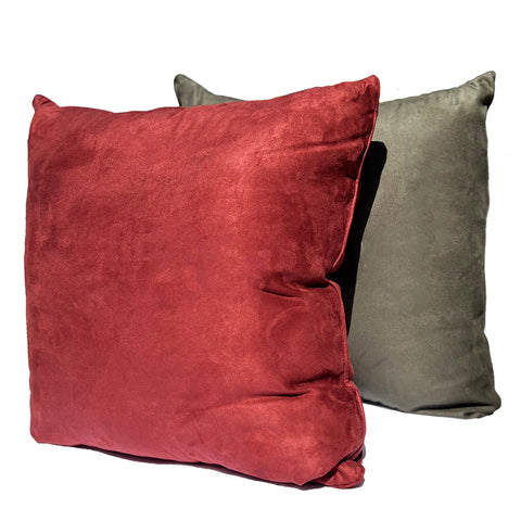 Two Pillowtex Faux Suede Decorative Throw Pillows in red and green on a white background.