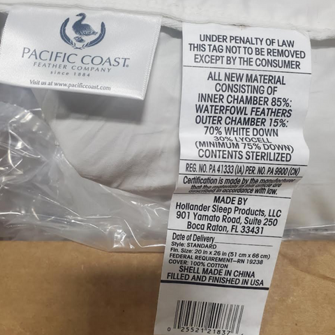 A Pacific Coast Feather Tria Down & Feather Pillow in a box with a label from Pacific Coast Feather Company.