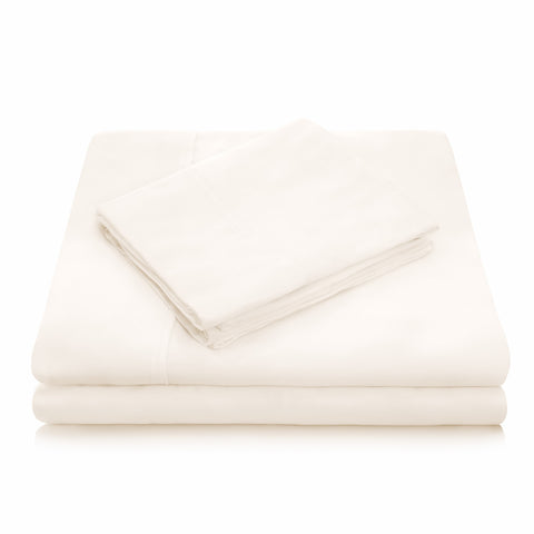 Luxurious Malouf Tencel sheet set in ivory, known for its softness and eco-friendly qualities.