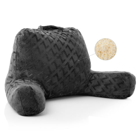 A comfortable Malouf lounge pillow with a doughnut on it.