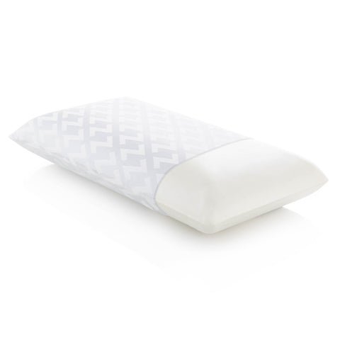 A Malouf Dough Memory Foam Pillow for comfort on a white surface.