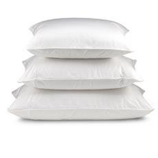 Three high-quality Downlite Cambric Eco Cluster Pillows stacked on top of each other.