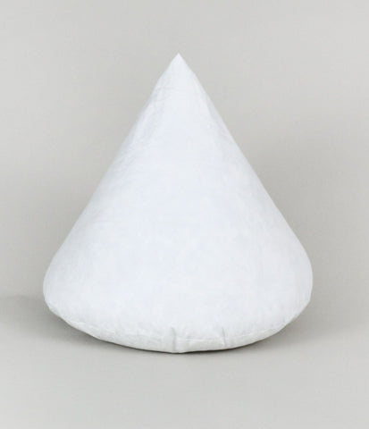 A Down Etc. Decorative Pillow Insert | Cone on a grey background, filled with hypoallergenic feathers and covered in cotton.