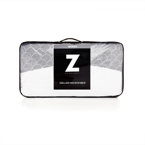 A white Malouf Gelled Microfiber Pillow with a z logo on it, from Malouf.