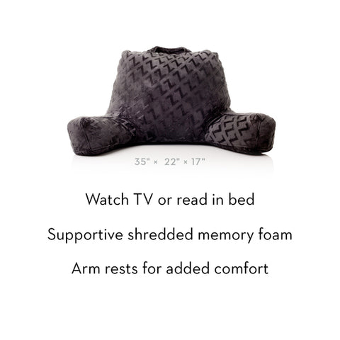 Watch tv or read in bed with the comfortable shredded memory foam Malouf Lounge Pillow for added support.