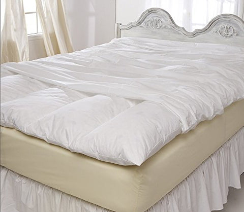 A bed with a Pillowtex Featherbed Cover.