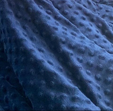 A close up of a Pillowtex Minky Dot Reversible Duvet Cover for Weighted Blanket with dots on the bamboo side.