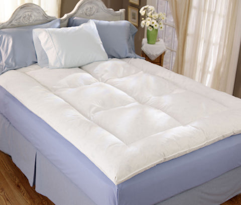 A white comforter made with Final Sale: Restful Nights Down Alternative Fiber Bed for added support.