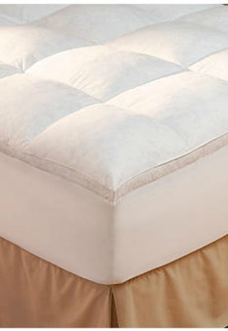 The bed is topped with a cozy Restful Nights Innova Fiber Bed | Ultra Lofty Mattress Topper for a restful night's sleep.