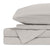 The Delilah Home Final Sale: Organic Hemp Bed Sheet Collection in light gray includes a flat sheet, fitted sheet, and two pillowcases. Soft and smooth, the temperature-regulating set is neatly folded against a white background.