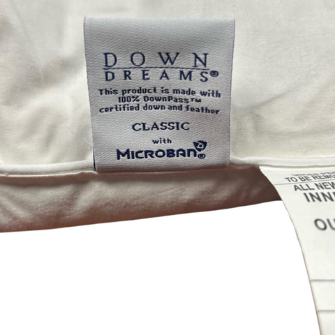 Indulge in the luxurious comfort of Manchester Mills Down Dreams Classic Soft Pillow, featured at many hotels.
