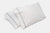 Two white Cotton Bed Pillowcases with Piping by American Blossom Linens, made from 100% USA cotton, lie side by side. Their simple dark blue piping and percale weave create a clean, soft, and elegant addition to your bedding.