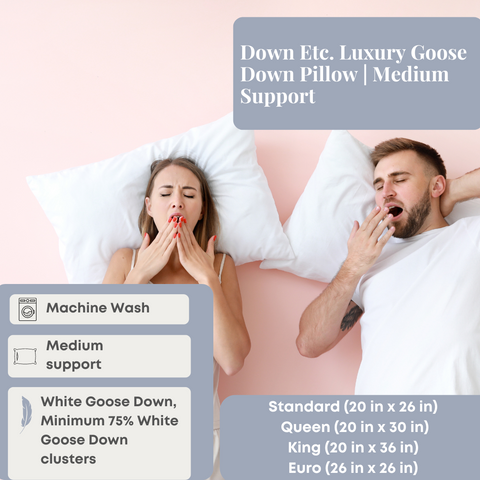 A couple lies in bed with Down Etc. Luxury Goose Down Pillows, seemingly disturbed by allergies or a cold, highlighting the pillow's machine washable feature and medium support with a minimum of 75% white.