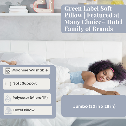 A woman is sleeping in bed on a Green Label Soft Pillow by Keeco, enjoying the pillow support.