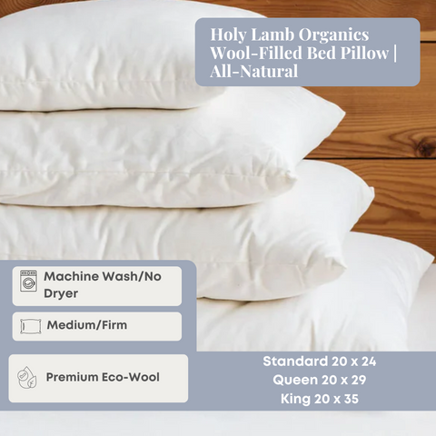 Revised Sentence: A stack of fluffy Holy Lamb Organics Wool-Filled Bed Pillows, all-natural and presented in pristine white organic cotton Sateen pillowcases, with icons indicating they are machine washable, have a.