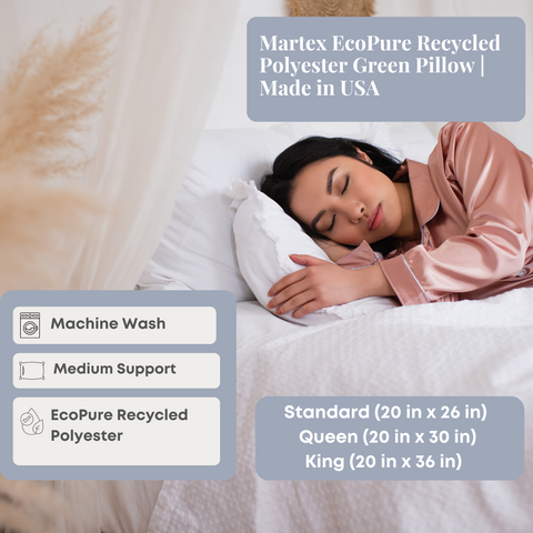 A woman in a satin blouse sleeps peacefully on a WestPoint Home Martex EcoPure Recycled Polyester Green Pillow, advertised as machine washable and Oeko-Tek certified, available in standard and queen sizes.
