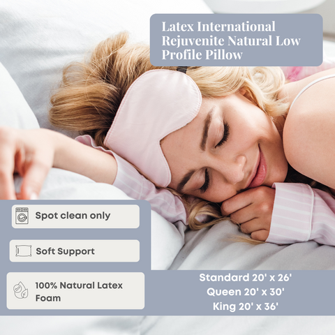 A content woman sleeps with a pink eye mask, resting on a Latex International Rejuvenite Natural Low Profile Pillow featuring soft support, spot clean only, and standard queen size dimensions.