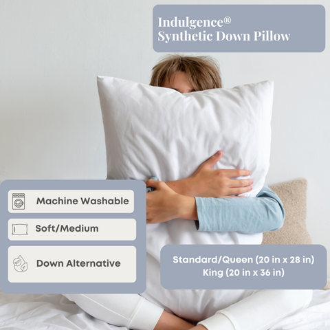 A person hugs a large white pillow with their face hidden behind it. The text on the image advertises the pillow as "Carpenter® Indulgence® Down Alternative Pillow," highlighting features like machine-washable.