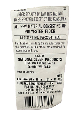A white material tag from Restful Nights showing text that includes registration and certification numbers, product size, fiber contents declaring 100% Ultima Spiral Spun Fibers, and U.S. origin with a Restful Nights Egyptian Cotton Pillow | Firm.