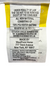 Close-up image of a white and yellow product tag with multiple sections of text. The first section emphasizes the legal notice stating the tag should not be removed except by the consumer. The tag details that the item contains 100% polyester batting, much like Martex Brentwood Gold Pillows - Featured at Many Hotels, with manufacturing information including WestPoint Home in New York, NY. The bottom section lists federal textile details, including